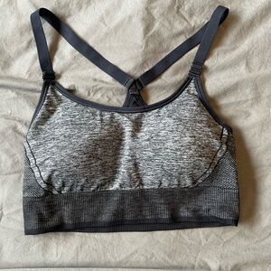 All In Motion XL black and grey racer-back sports bra.